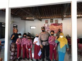 Vaksinasi Anak Usia 6-11 Tahun Bersama Polri dilaksanakan di Kalurahan Dadapayu